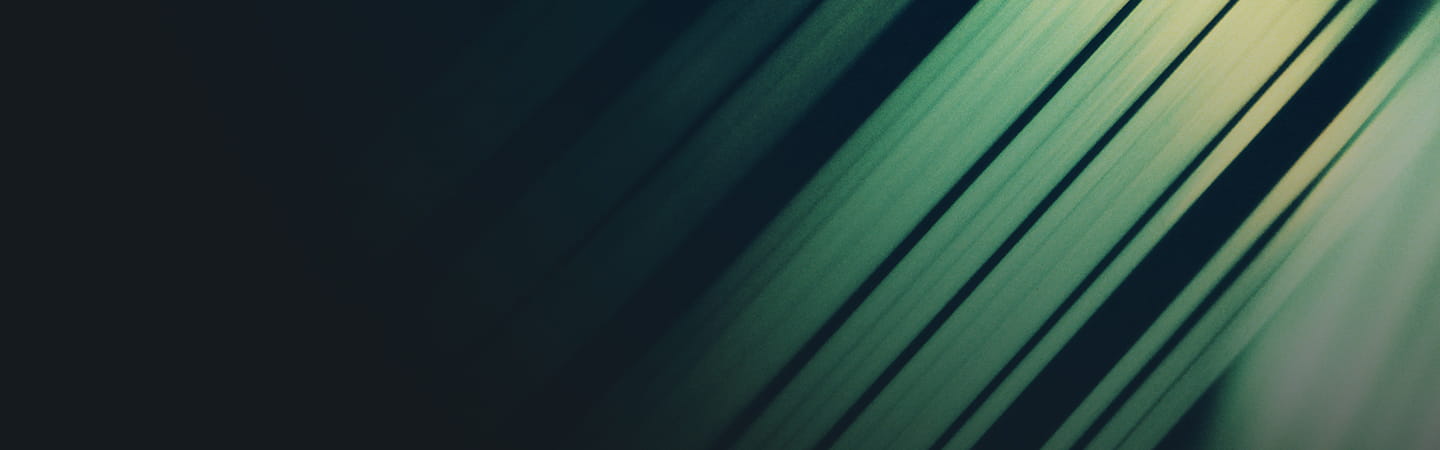 Abstract wallpaper featuring flowing green lines featured on the Climate Transition Report.