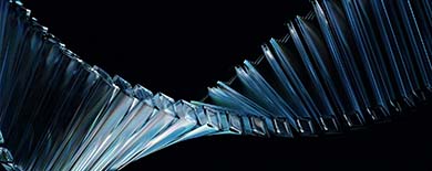 Abstract crystalline wave structure in blue on black background for Ashurst Perkins Coie M&A Lifecycle Solution